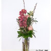 Elegant bouquet with cymbidium orchids, delicate roses in rosé, white berry decorations and pussy willows, combined with green leaves and fine twigs - tied loosely and in a modern way.