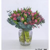 Springy tulip bouquet with pink-green tulips, delicate pink limonium and silvery eucalyptus - loosely tied in a natural style.