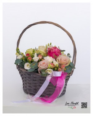 Romantic flower basket with roses in pink, cream and pink - lovingly put together with fragrant eucalyptus and delicate bows. Perfect as an anniversary gift, birthday gift or just to say “I’m thinking of you” from the heart.