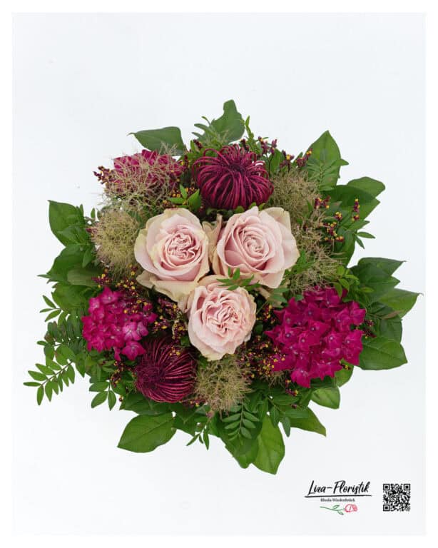 Elegant bouquet with large-flowered pink Ecuador roses, intense pink hydrangeas, purple statice, fine wig bush and dyed American as a sophisticated accent - embedded in lush greenery.