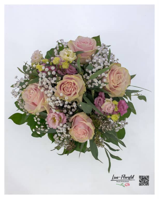 High-quality bouquet of 5 delicate pink roses, combined with lisianthus, loose gypsophila and fresh eucalyptus, stylishly arranged for special occasions