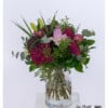 Opulent bouquet of flowers with roses, celosias, angelica giga, pincushion protea, lilies and eucalyptus - elegantly tied in harmonious colors.