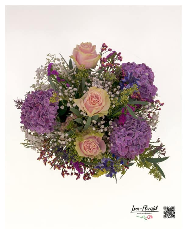 Top view of the opulent bouquet - harmoniously arranged flowers in shades of pink and purple with fresh green, loosely and elegantly tied by Liza-Florist.