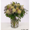 Delicate bouquet with Ecuador roses in cream, pink and fresh greenery – airy arranged, modern and elegant