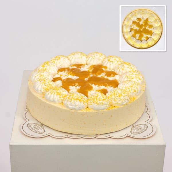 Birthday cake with fruity peach and passion fruit cream as a sweet surprise.