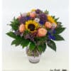 Colorful summer bouquet with sunflowers and roses