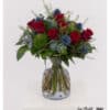 Timeless bouquet with red roses – featuring eryngium, carnations and eucalyptus
