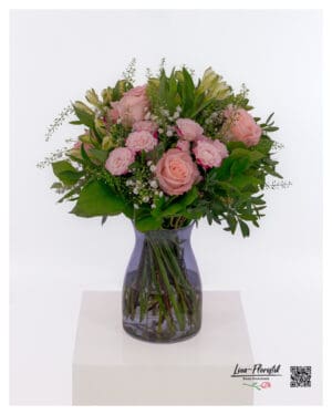 Pink flower bouquet with roses, alstroemerias and baby's breath